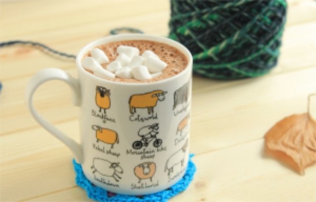 Yarn and hot chocolate in a sheep mug with marshmallows: read more about the worst day at GamerCrafting